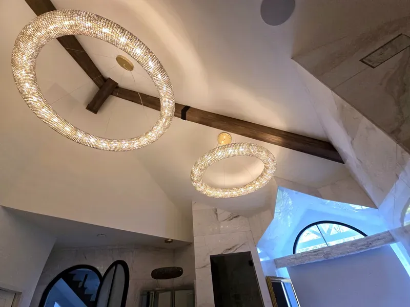 Vaulted ceiling with a real wood beam and cross beam