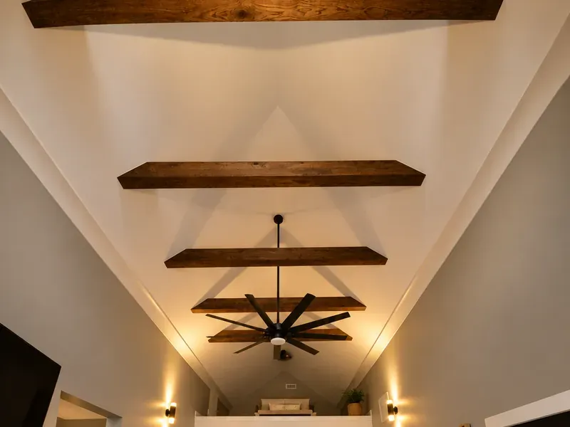 Design concept of dark real wood beams across a vaulted living room ceiling
